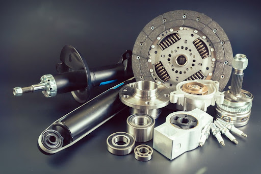 Assortment of car components laid out for viewing or sale